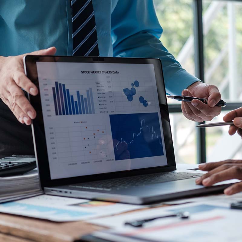 Accountant showing a tablet with charts to client
